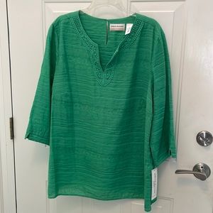 Rich green tunic with beaded neckline.